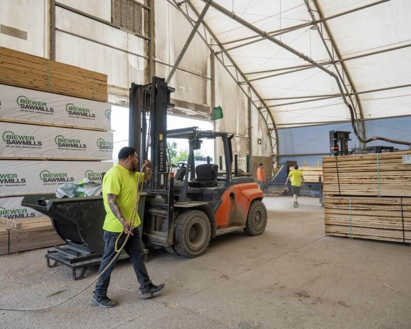 employees working in lumber yard